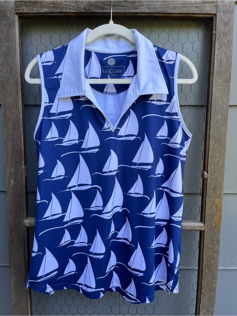 Ana Clare Blue And White Sleeveless Polo Shirt With White Sailboats Size L